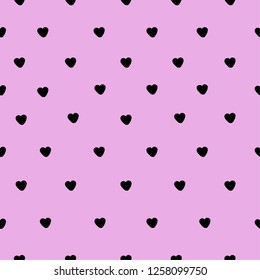 A pattern of hearts. Pink background, cute black hearts. Good for packaging, postcards, textiles.