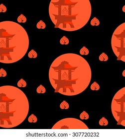 The pattern in the Japanese style with Japanese stone lanterns and stylized flames on a black background. It can be used for fabric, wallpaper.