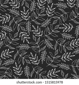 Pattern with leaves and flowers.  Black background.