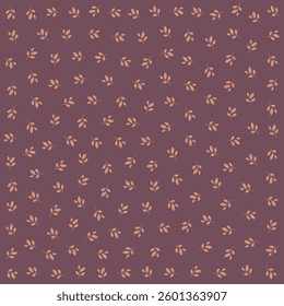 a pattern of leaves on a purple background