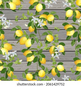 Pattern with lemons on a wooden background.Branches with lemons and flowers on a wooden background in a colored seamless pattern.