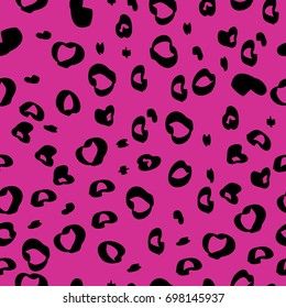 Pattern with leopard spots on a crimson background