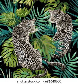 pattern of leopard and tropical leaves on a black background.