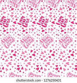 Pattern of the lettering doodle and the freehand hearts. Freehand sketch drawing of doodle hearts. Love background in pink color. You are loved. I am in love