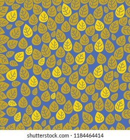 Pattern light brown and yellow leaves on a dark blue background