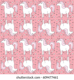 Pattern made of illustrated unicorns and sparkles on pink