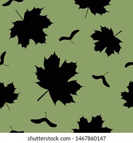 Pattern with maple leaves on green background. Vector