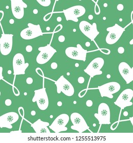 Pattern of mittens. Green background, white mittens, snow. Good for packaging, banner, postcards. Simple seamless pattern.
