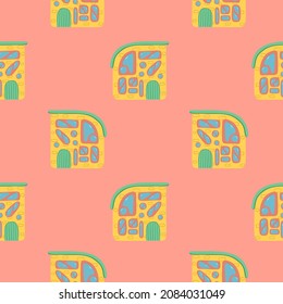 A pattern of multi-colored flat art nouveau houses. House with unusual windows. EPS 10 without transparencies.