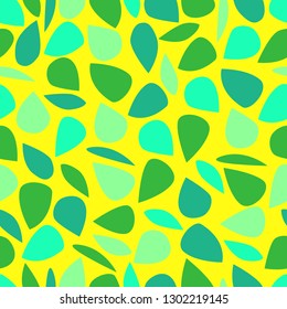 pattern of multi-colored green leaves of trees on a yellow background