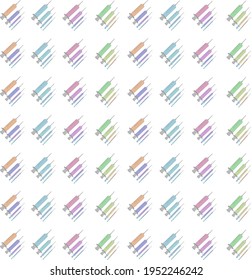Patrón de jeringas multicolores sobre fondo blanco 