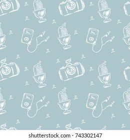 pattern of musical instruments and a photocamera painted in a stylet sketch of separate doodle lines on a white background