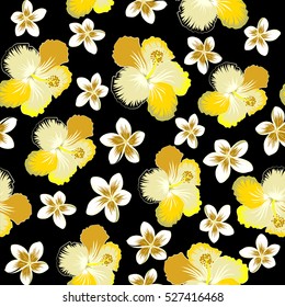 Pattern on a black background in beige, neutral and yellow colors. Vector vintage seamless tropical hibiscus flowers.