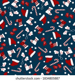 Pattern on a blu background -mittens, socks, santa hat. Christmas and New Year. Vector illustration. For packaging, decoration, fabric and scrapbooking. 
