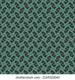 Pattern on a blue background made of pixels and icons drawn in black. Retro or modern textile design.