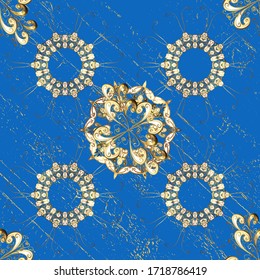 Pattern on blue and beige colors with golden elements. Furniture in classic style. Blue and beige backdrop with gold trim. Luxury furniture. Seamless element woodcarving. Small depth of field.
