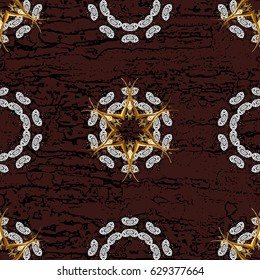 Pattern on brown background with golden elements.  