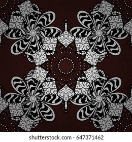 Pattern on brown background with white elements. Carving. Patina. Furniture in classic style. Small depth of field. Luxury furniture. Brown backdrop with white trim. Ornamental element woodcarving.
