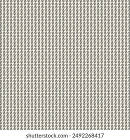 Pattern on a light gray background consisting of small rectangular and triangular black patches. Textile design for blazers, trousers and skirts. Abstract vector.