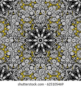 Pattern on yellow background with golden elements.