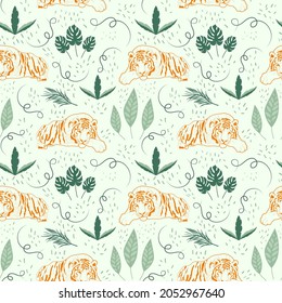 Pattern orange tigers and leaves. Vector illustration. For packaging, prints, fabric and wallpaper printing, covers, brochures and other decor.