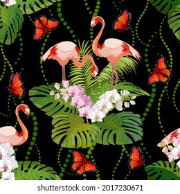 Pattern with orchids and flamingos.Flamingos, orchids and palm leaves on a black background in a vector pattern.