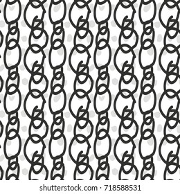 pattern of oval painted black lines on a white background with textures