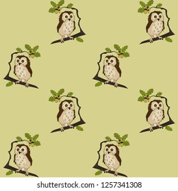 the pattern of the owl nestling sitting on the oak