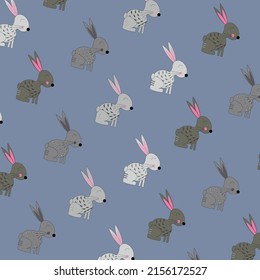 Pattern with painted colorful rabbits. Can be used for wallpaper, textiles, packaging, cards, covers. Small cute animal on a blue  background.