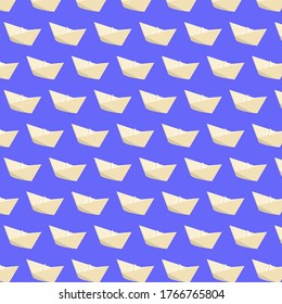 pattern of paper boats on a blue background