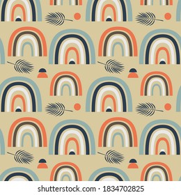 pattern with pastel rainbows and tropical leaves on a beige background in boho style, vector background 