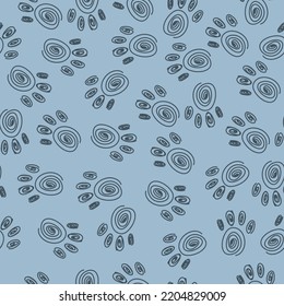 Pattern from paw prints. Print in pastel colors from animal tracks. Free hand. Seamless pattern. Vector illustration.