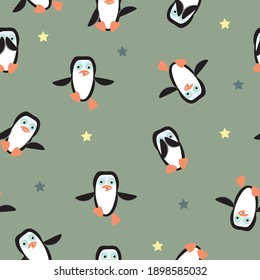 Pattern with penguins and stars on a green background. Penguin jumps, is surprised, covers his face with his wings