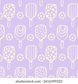 Pattern with pickleball balls and paddle. Sport seamless pattern with doodle paddle . Design for print, banner, card, fabric, cover, wrapping paper, wallpaper. Concept of sport, activities, hobbies.