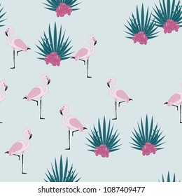 Pattern with pink flamingos, red hibiscus and palm leaves.