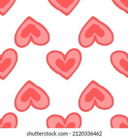 patrón de corazones rosados. patrón transparente de corazones rosados dibujados a mano dispuestos en diferentes direcciones en blanco para una plantilla de diseño