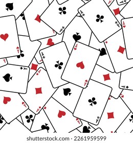 Pattern with playing cards. Playing cards scattered on the table. Suits of playing cards. Spades, Hearts, Clubs, Diamonds.
