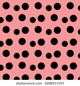 The pattern is a polka dot pattern, featuring an array of black filled circles on a pink background.