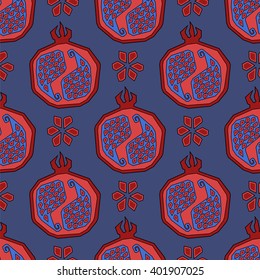 Pattern with a pomegranate and seeds. Ethnic style.  in red and blue colors.