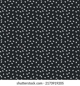 Pattern for print and decoration. White seeds on a black background. Vector repeating pattern.