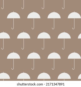 Pattern for print and decoration. White umbrellas on a brown background. Vector repeating pattern.
