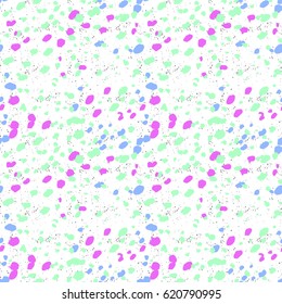 a pattern of purple, blue and green spots