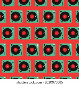 Pattern with a record player on a red background. Flat repeating pattern. Can be used as a background.