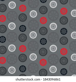 Pattern red, black and white circles on the dark gray background