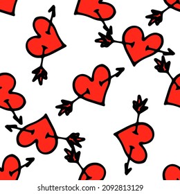 ein Muster eines roten Herzens, das von einem Pfeil durchbrochen wird. nahtloses Muster eines hellroten Herzens, das im Doodle-Stil mit einem Sterlet-Innern gemalt wurde, chaotisch auf weiß für eine Valentinstag-Designvorlage