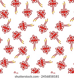 A pattern of red threads is tied into Chinese knots for good luck, symbolizing prosperity. Red threads in knots with gold beads. Materials in the traditional Asian style are used in cultural