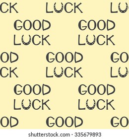 Pattern with repeating grey colored lettering good luck with horseshoe as letter u isolated on flaxen background. Flat style vector illustration