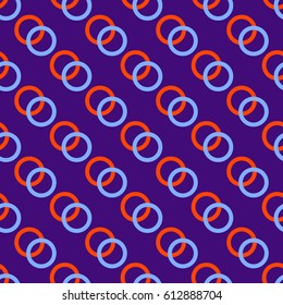 A pattern of rings on a purple background