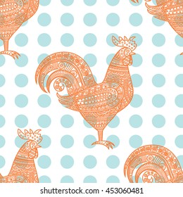 Pattern from roosters. A background in blue peas.