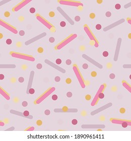 A pattern of round shapes. Pink, yellow and red confetti.